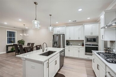 Gas cooktop with a Microwave and Oven built into the wall