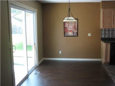 Dining with brand new patio door, flooring, paint 