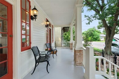 Wonderfully inviting covered front porch.