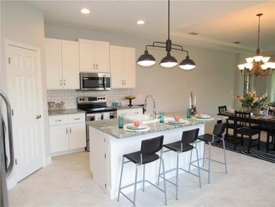 Large 4 person eat-in kitchen bar with farm sink a