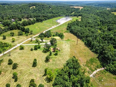 Overview of rural landscape with a heavily wooded area