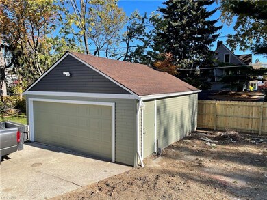 2 car garage with light, new door, new siding