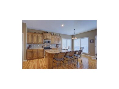 Island offers plenty of space for extra seating!