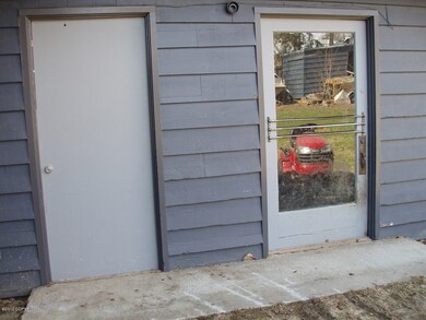 Garage and shop man door to back yard