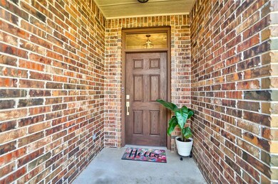 Beautiful front door and covered porch.
