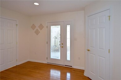 Enter this home through a covered porch to this fo