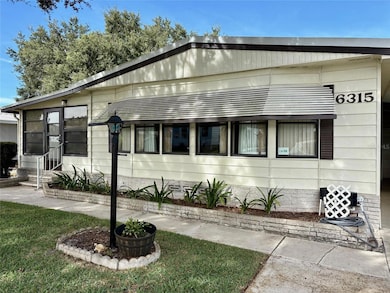 6315 Grove Pointe Drive South E, Winter Haven, FL 33884 - photo 2