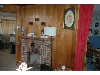 Family Room. Wood burning fire place in family roo