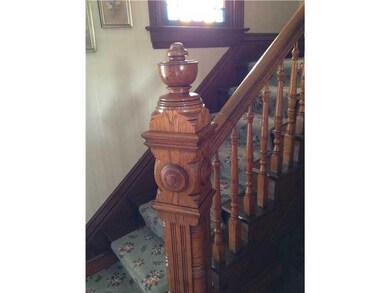 Entry/Foyer. This gorgeous woodwork is throughout.