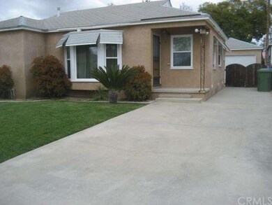 NOTE EXTRA WIDE DRIVEWAY