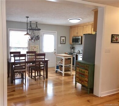 Shiny hardwood floors and open concept living.