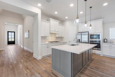 As you come in you are greeted by 13-foot ceilings!
