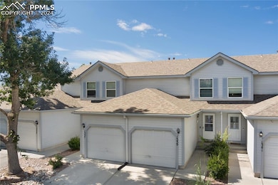 View of property featuring a garage