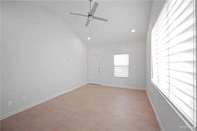 Unfurnished room with a ceiling fan, light wood-type flooring, baseboards, and recessed lighting
