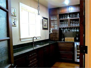 Other. Wet bar with a wine refrigerator and plenty