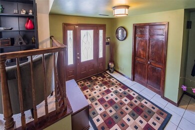 The spacious, 11x10 Entry/Foyer has a large coat c