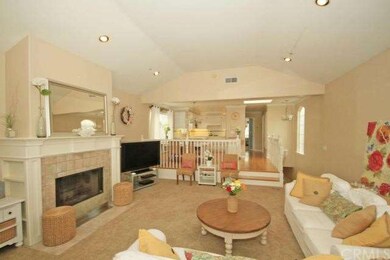 Foreground has your new living room with a firepla