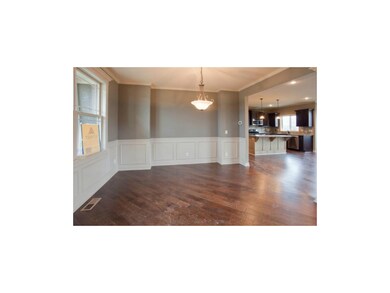 Pre-finished Hand-scrapped hardwood floors in entr