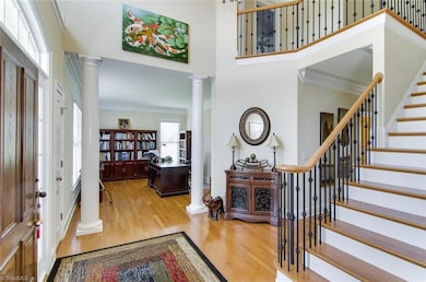 Beautiful Entry looking into Living room used as an office.