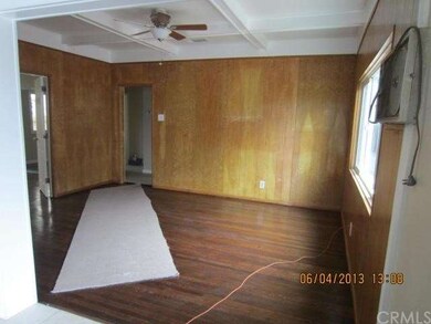 Dining room. Piece of carpet placed temporarily to