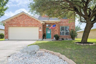 View of front of property featuring brick siding,