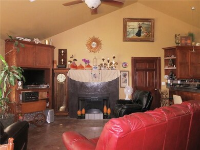 Open living area with cathedral ceiling, built-in 