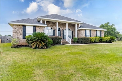 View of front of property featuring brick siding, 
