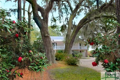 View of front of house from camellia garden