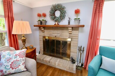 Living room with wood burning fireplace