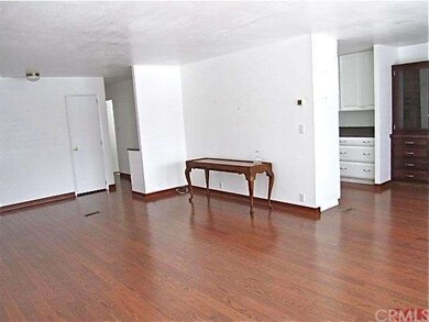 Living room open to dining room
