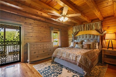 Master with access to porch and pool