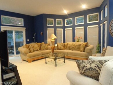 Living room and dining room area overlooking the p