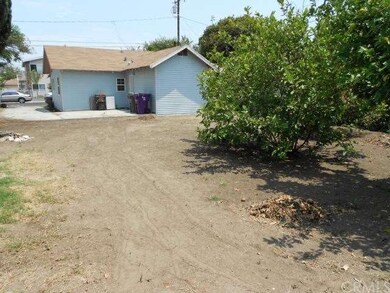 Huge Backyard w/Fruit Trees & Great Opportunity to