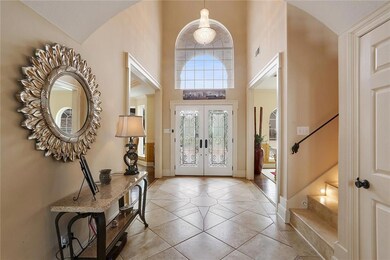 Beautiful foyer with dining and formal living room