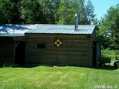 Outbuilding. Contains wood burning furnace with wo
