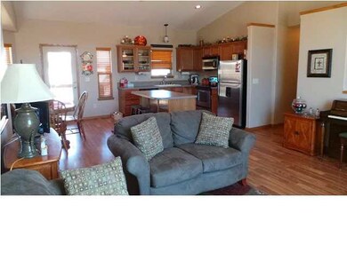 Living room features wood laminate floors!