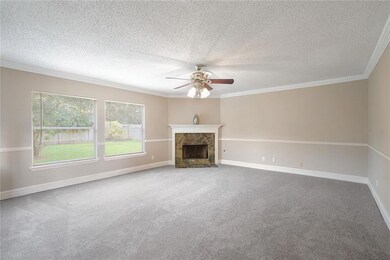 Living room with slate fireplace and big picture w