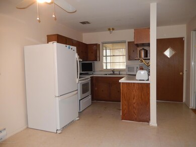 Kitchen looking at front door