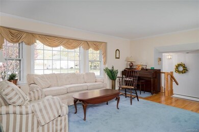 Note beautiful hardwood floors which are throughou