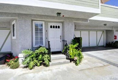 Unit 2's entry & garage
