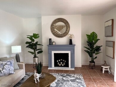 Fireplace with electric outlet.