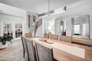 A sleek overhead light fixture adds visual interes