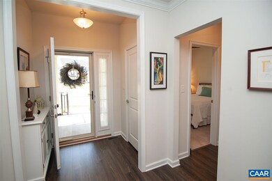 Bedroom and full bath off of foyer area