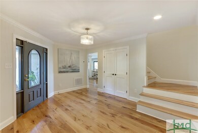 Foyer, steps to bonus room.