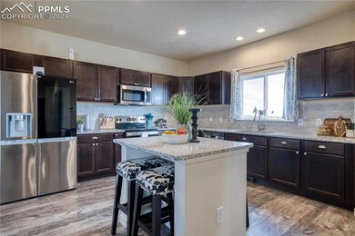 The Kitchen also boasts an island with a counter b