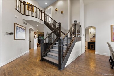 Foyer/Entry showcasing high ceilings and natural light