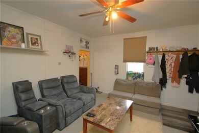 Large Living Room leads into Eat-in Kitchen