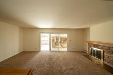 Over sized sliding doors to the private patio!