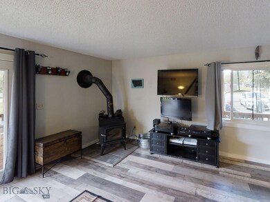 149 Juniper Berry Dr unit B, Big Sky, MT 59716 - photo 2