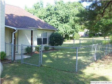 Small fenced area outside great room door.